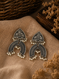 Charulata Silver carved mor earring